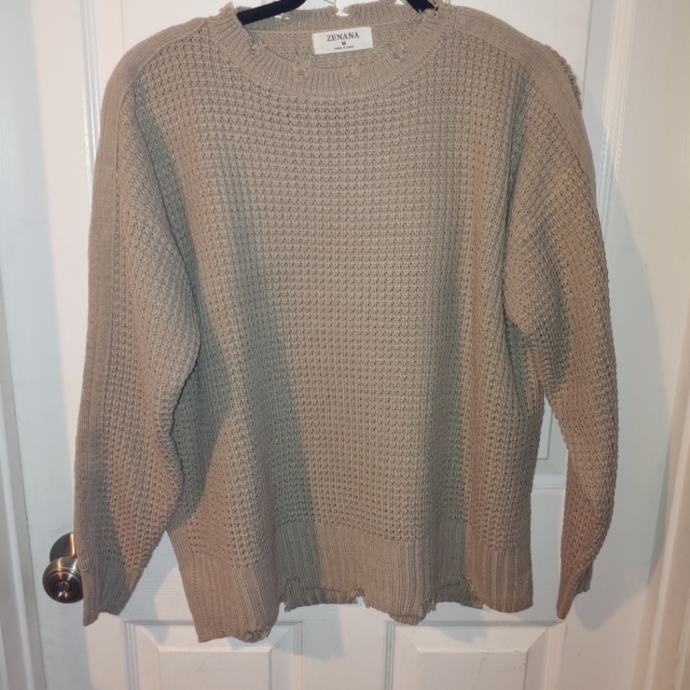 Distresses sweater